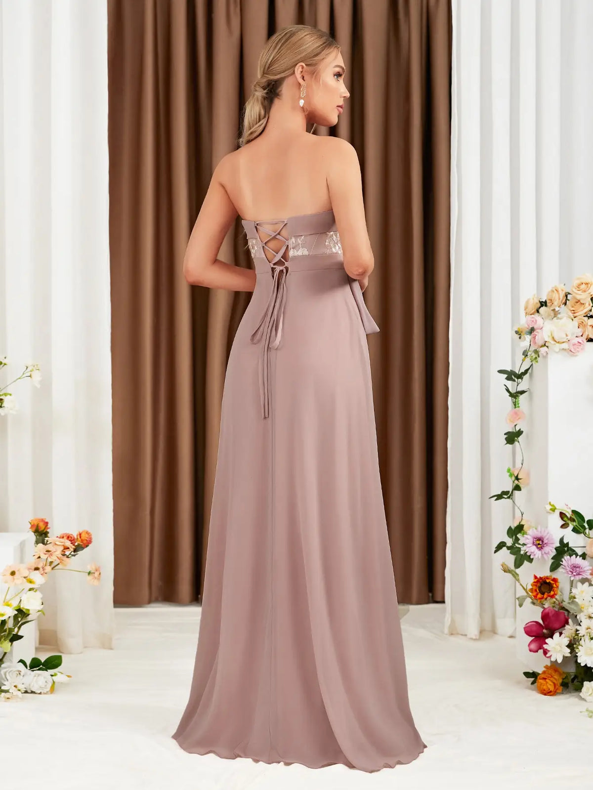 The adult formal dress is wrapped around the chest and decorated with a belt on the back